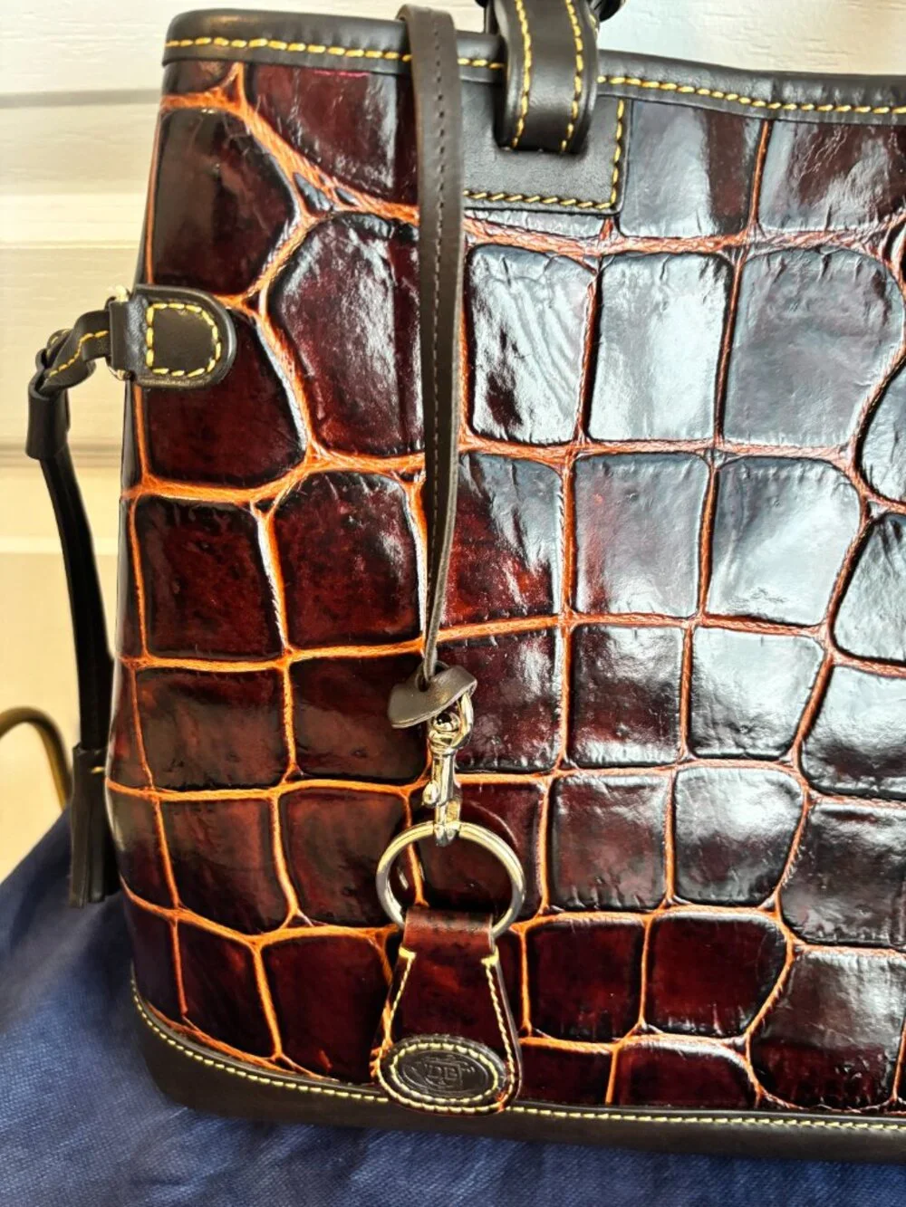 Dooney & Bourke croc‐embossed tote + dust bag